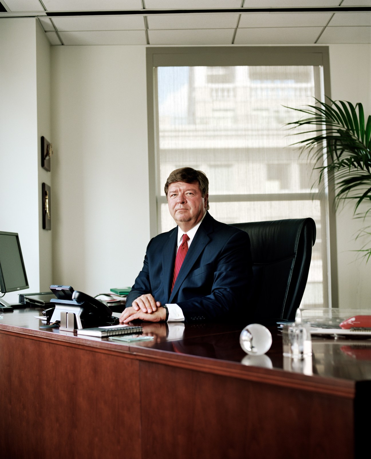Pierre Gauthier, President and CEO of Alstom US, seated at his desk in a Washington office.