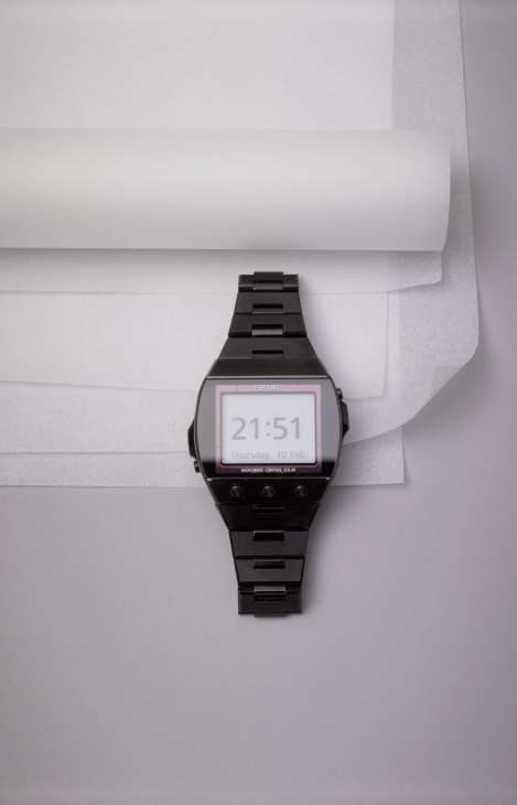 Seiko Active Matrix EPD digital watch with black stainless steel band displaying time 21:51 on screen.