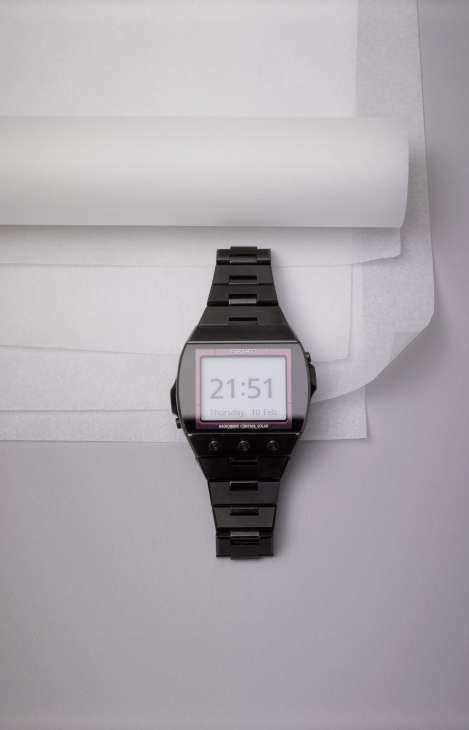 Seiko Active Matrix EPD digital watch with black stainless steel band displaying time 21:51 on screen.