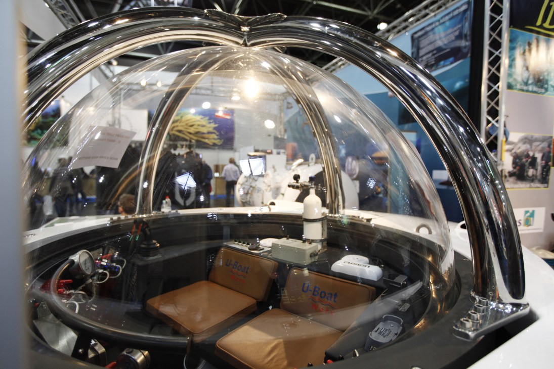 U-Boat Worx mini submarine interior with transparent dome cockpit displayed at Boot 2011 exhibition.