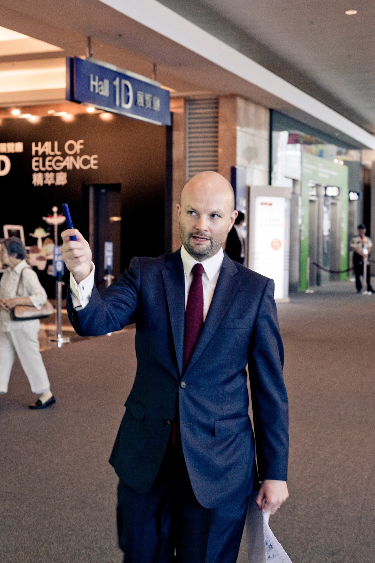 Magnus Renfrew in business suit at Hong Kong Exhibitions and Convention Centre