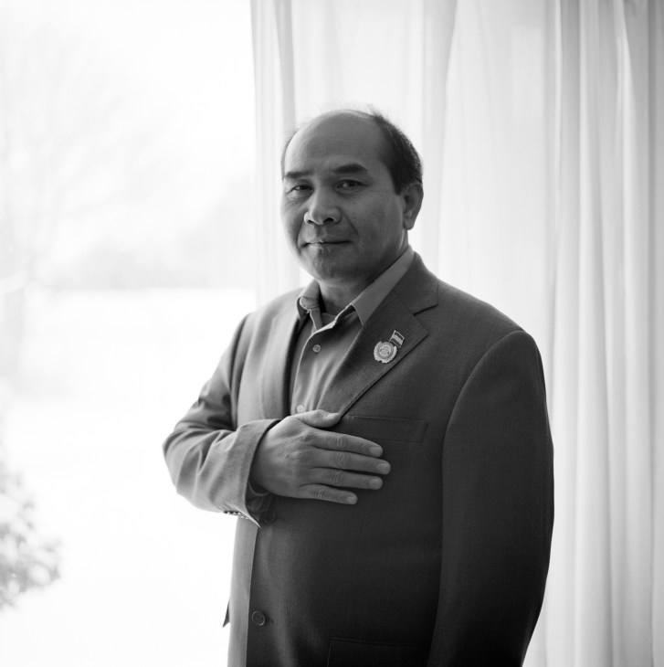 Thach N. Thach, President of the Khmer Kampuchea-Krom Federation, poses for a black and white portrait photograph.