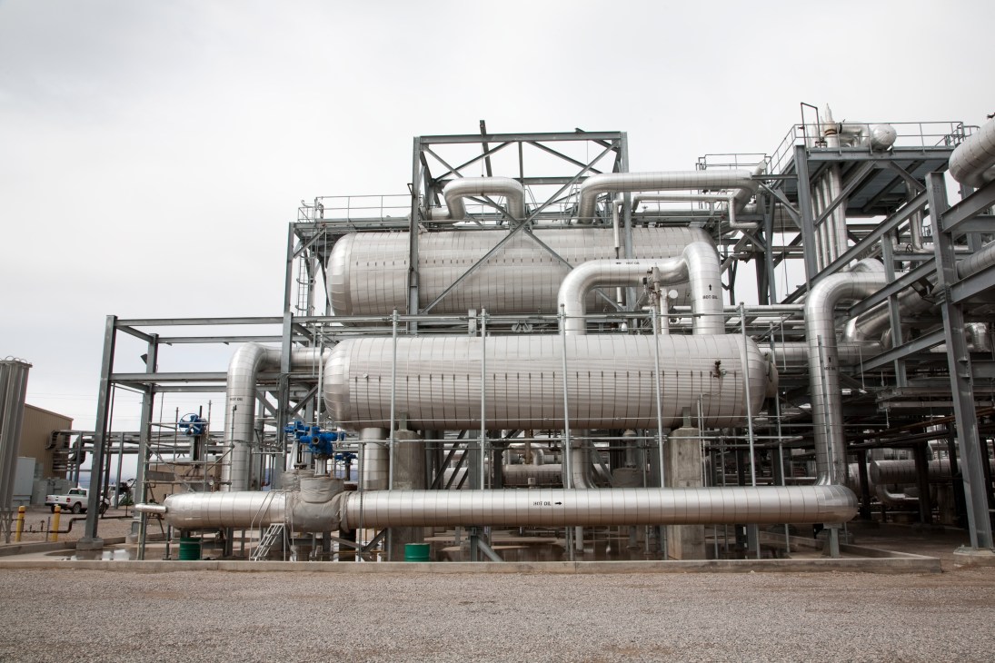 Heat exchange apparatus with large cylindrical tanks and metal piping at Nevada Solar One facility.