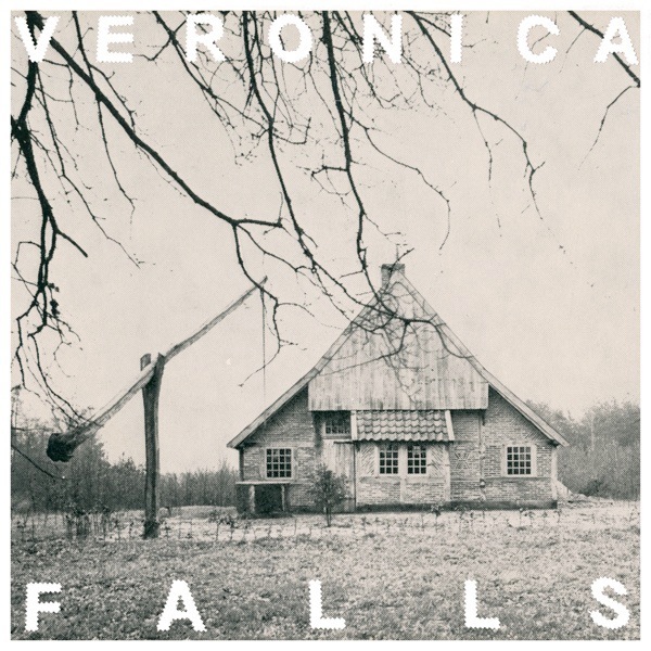 Album cover for Veronica Falls' self-titled debut showing a brick house in a bare field under bare tree branches.
