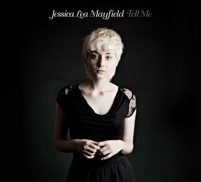 Jessica Lea Mayfield album cover featuring a woman with short blonde hair wearing a black dress against a dark background.