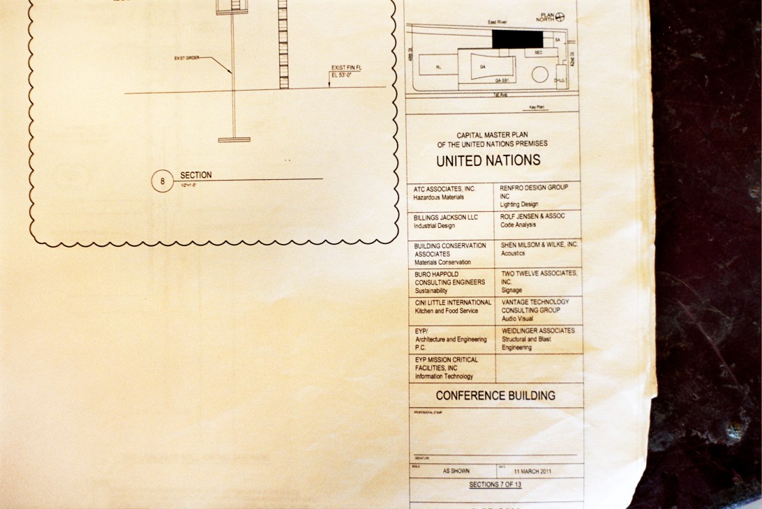 Architectural blueprint for the UN Conference Building showing section and floor plan details.