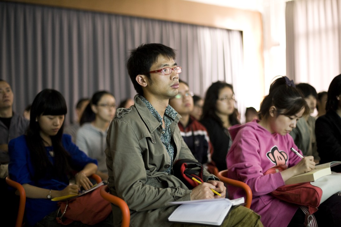 Students listening attentively during a lecture at Aalto-Tongji Design Factory in Shanghai