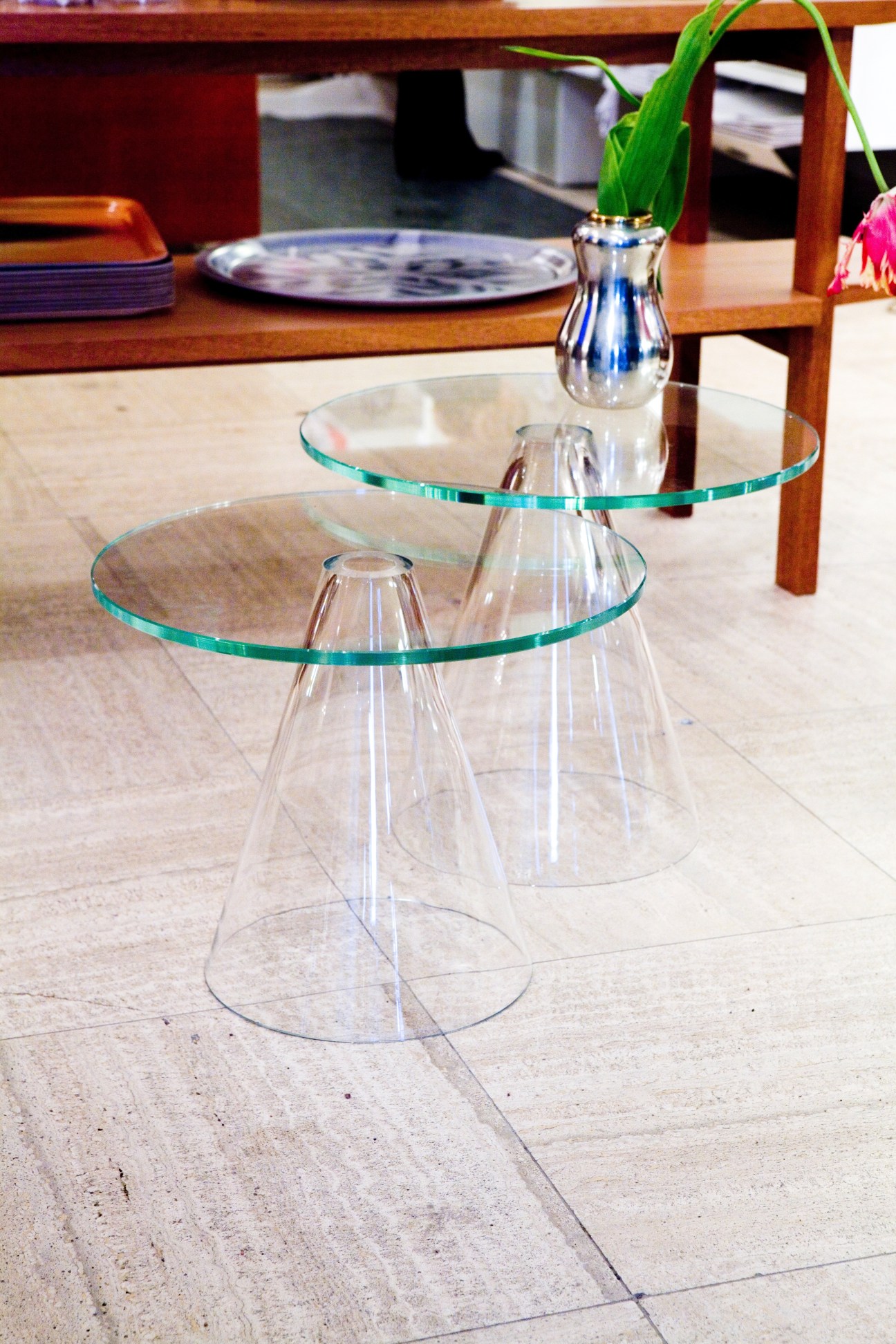 Glass table by Massproductions for Svenskt Tenn with conical glass base and round top