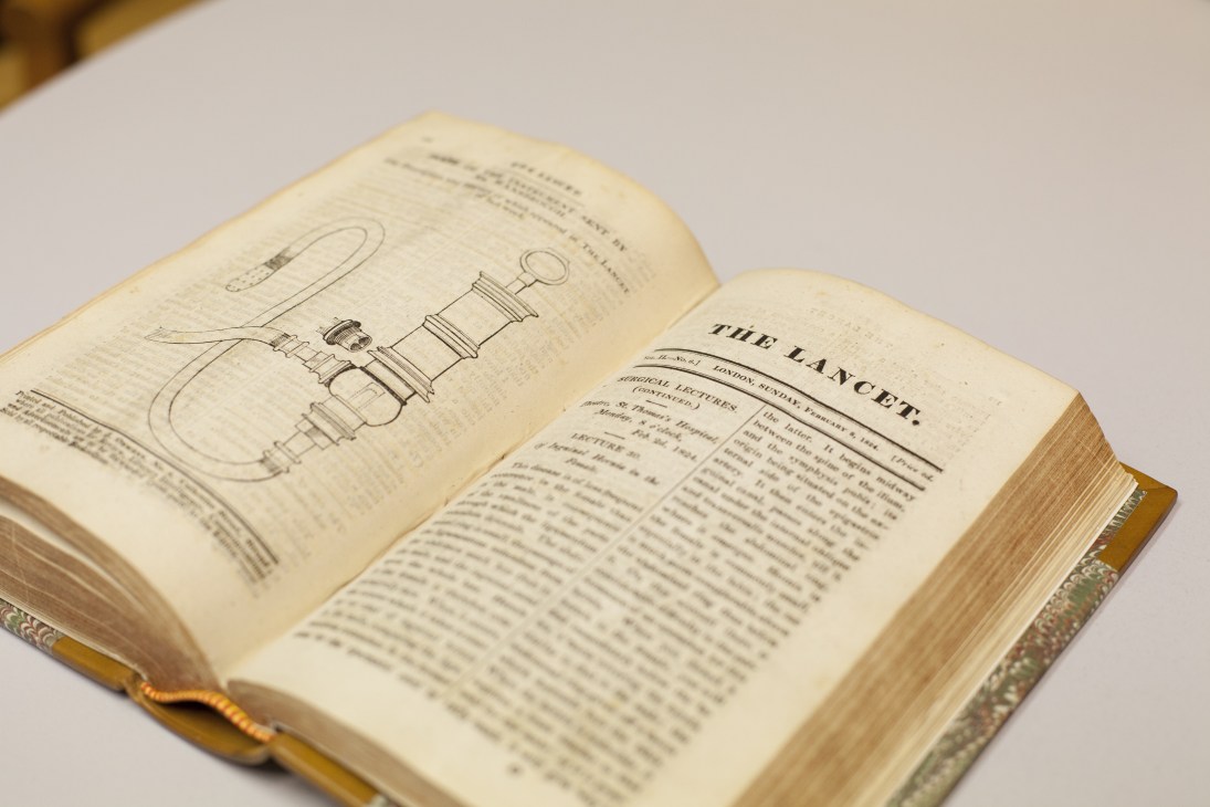 Open pages from an 1824 issue of The Lancet showing medical illustrations and text on aged paper.