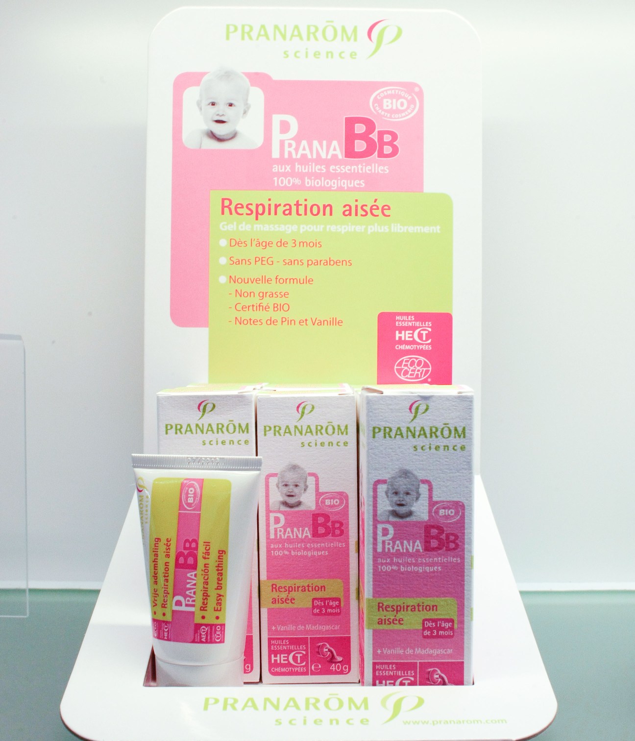 Pranarôm baby breathing gel display with pink and white packaging boxes.