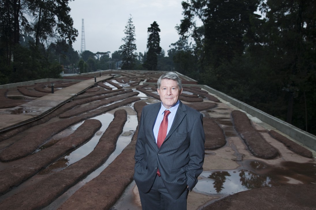 Dutch ambassador Hans Blankenberg stands on a rooftop with geometric patterns in Addis Ababa.