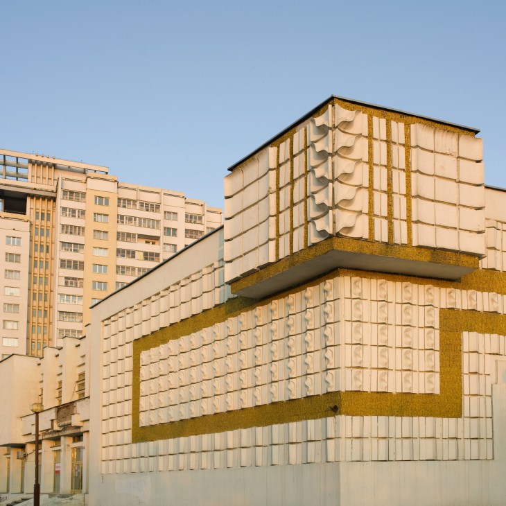Stalinist-style building with cream and gold facade in central Minsk.