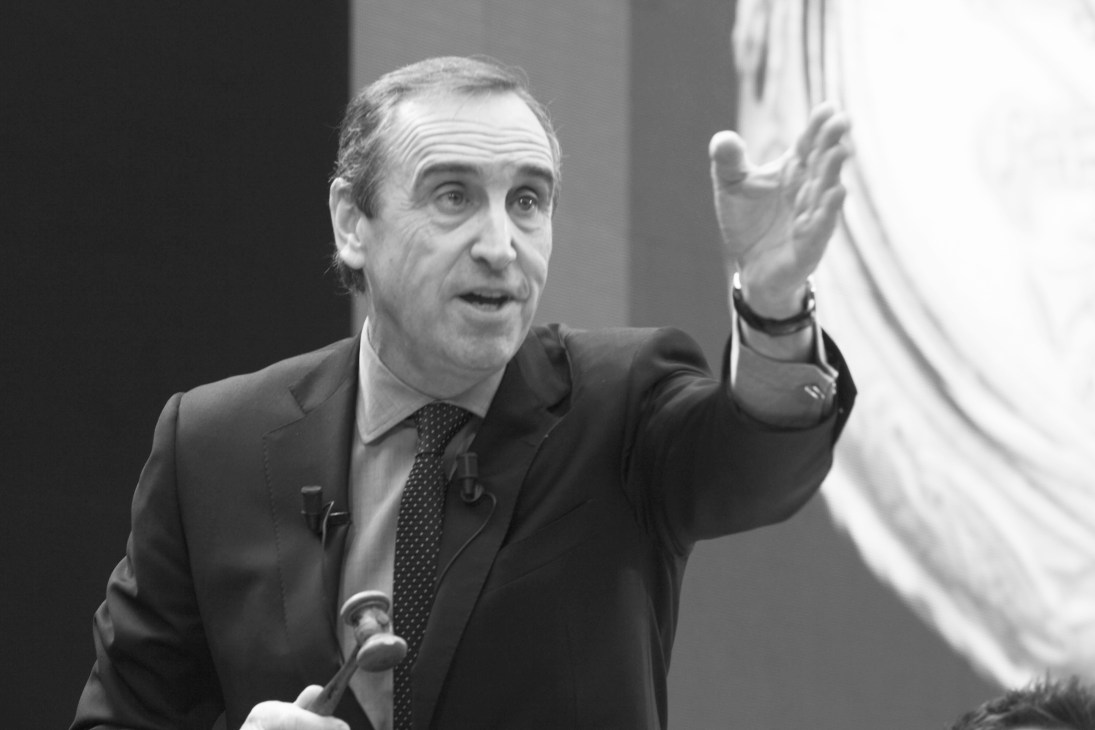 François Curiel, President of Christie's Asia, speaking at an event with hand raised expressively.