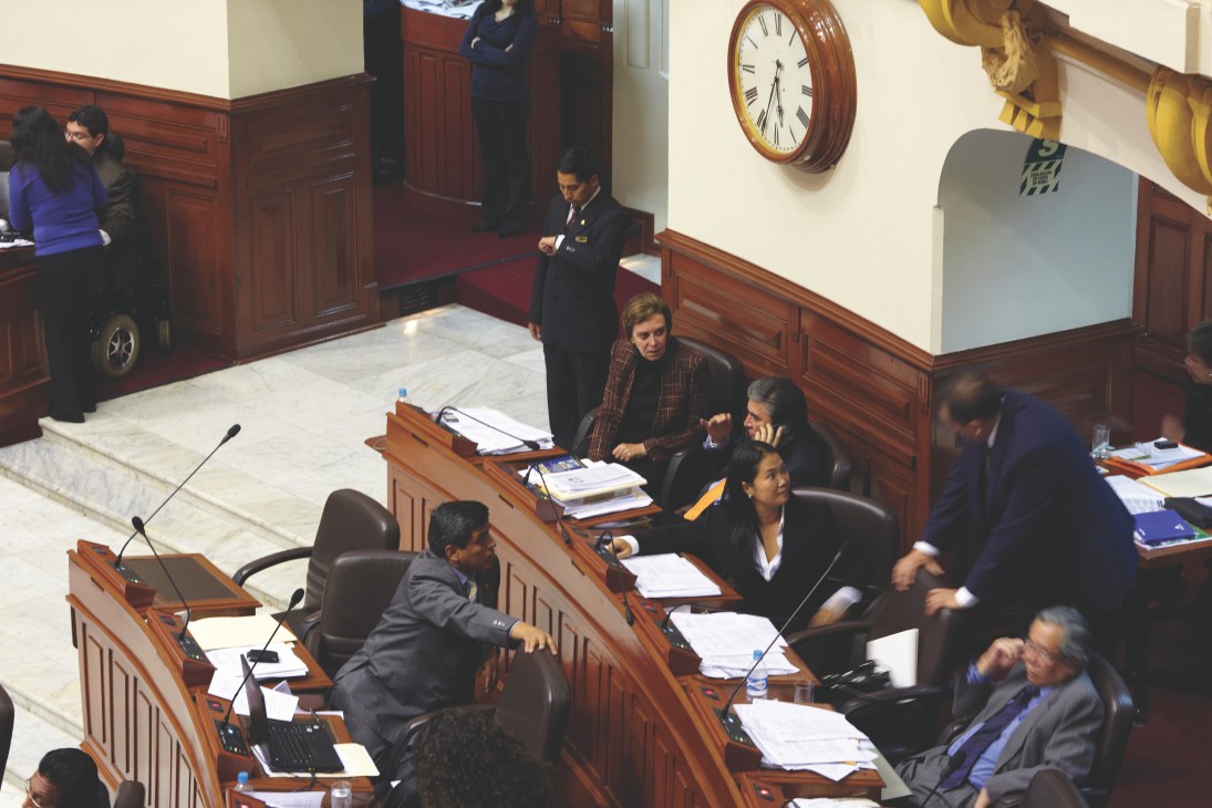 Keiko Fujimori sits in the congressional chamber during a legislative session in Peru's Legislative Palace.