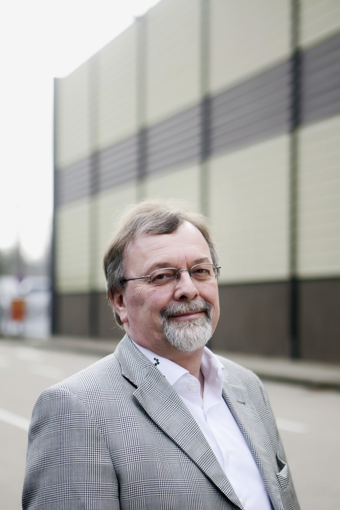 Werner Thomaier, head of Aqua Lung Germany, poses outside a building at Boot 2011.