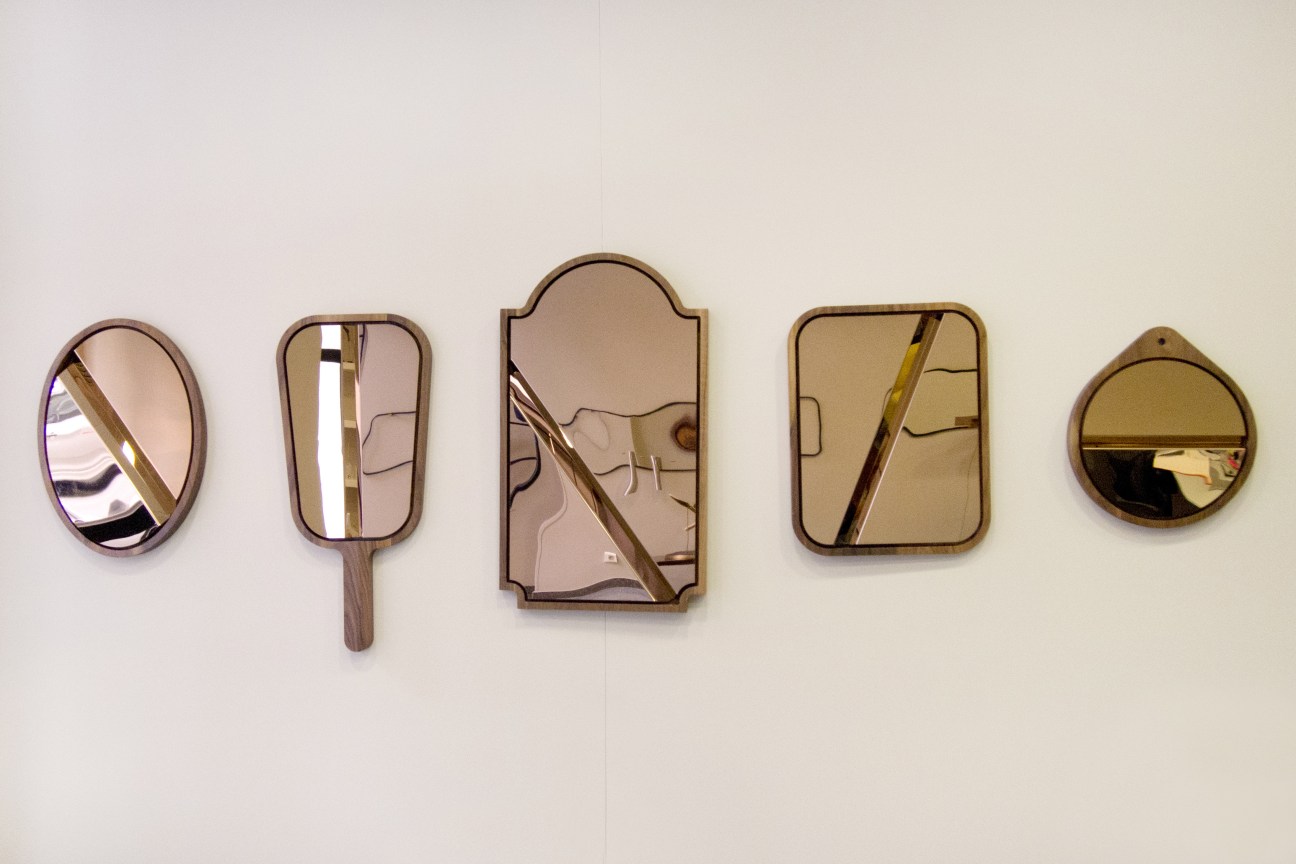 'Please, Don't Tell Mom' by Marc Dibeh: five decorative mirrors with wooden frames displayed on a white wall.