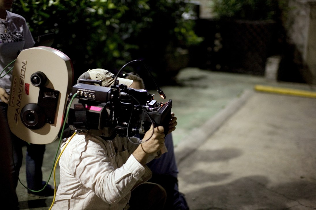 A cameraman films Dead of Night scene at the Lafitte Guest House in New Orleans' French Quarter.