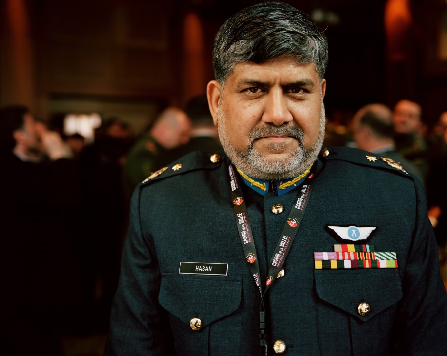 Pakistan's Air Commodore Hasan Kamran Zammarud in military dress uniform with medals and insignia.