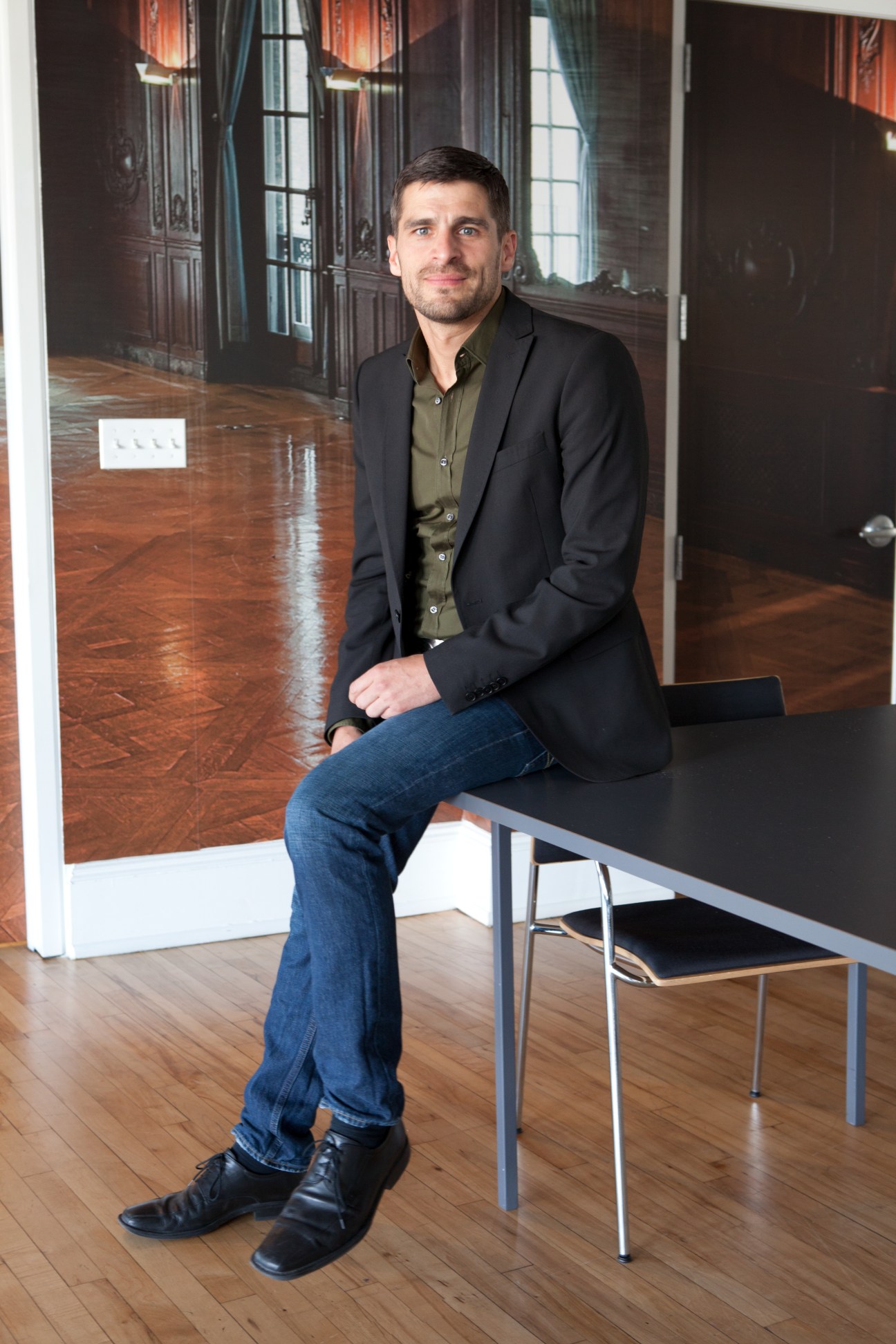 Wenzel Bilger, director of cultural programmes North America, sitting in a modern interior space.