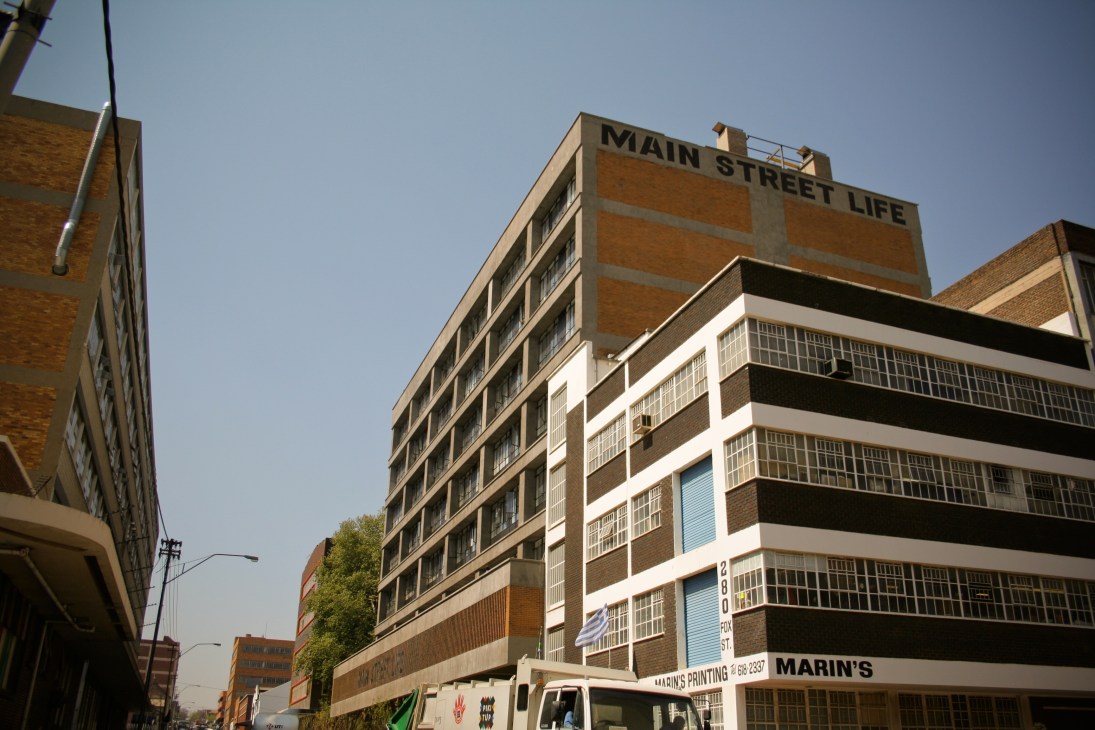 Main Street Life building in Johannesburg with signage visible on restored 1970s office block architecture.