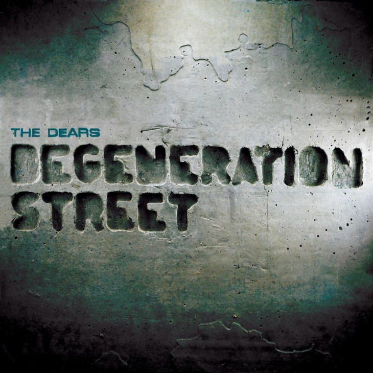 Album cover for The Dears' Degeneration Street showing embossed text on a textured concrete surface.