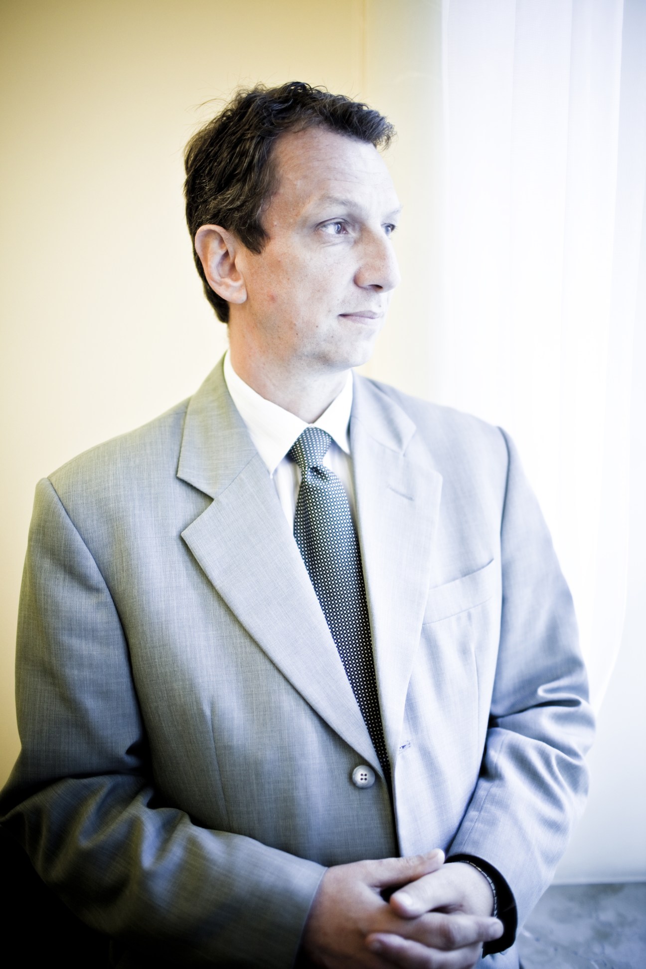 Andrzej Halicki, chairman of parliament's Foreign Affairs Committee, in a light grey suit and patterned tie.