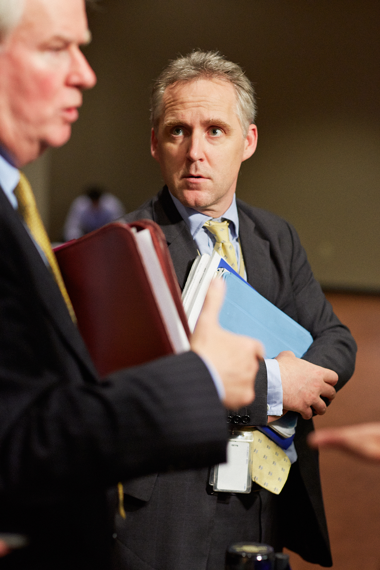 Michael Tatham, UK political co-ordinator, holding documents at the UN Security Council.