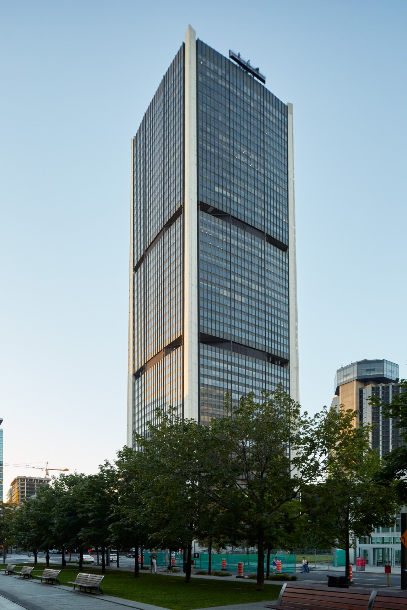 Tour de la Bourse, a tall modernist glass office tower with horizontal dark bands and white vertical elements