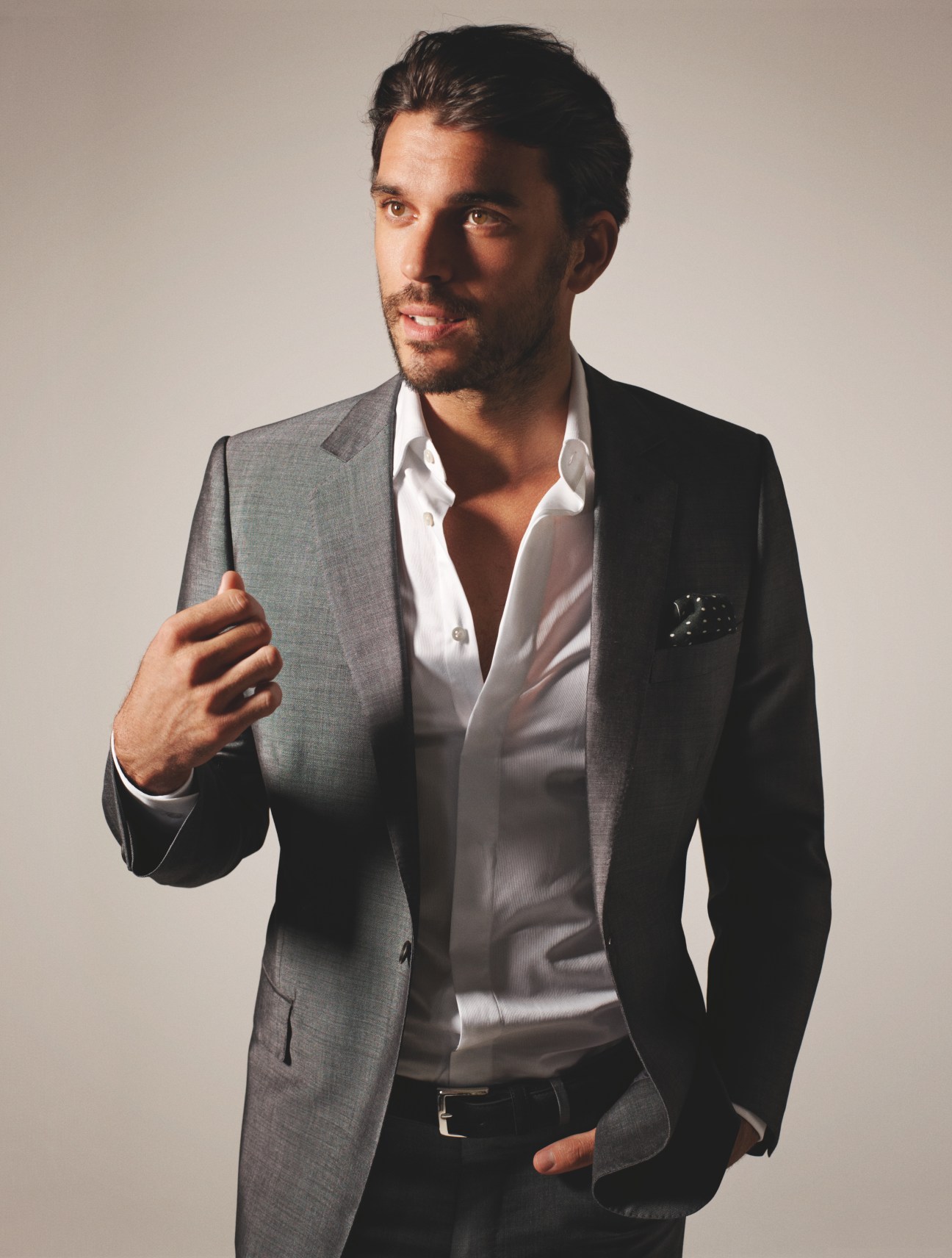 Male model wearing suit and shirt by Rake with Hackett pochette and Canali belt.