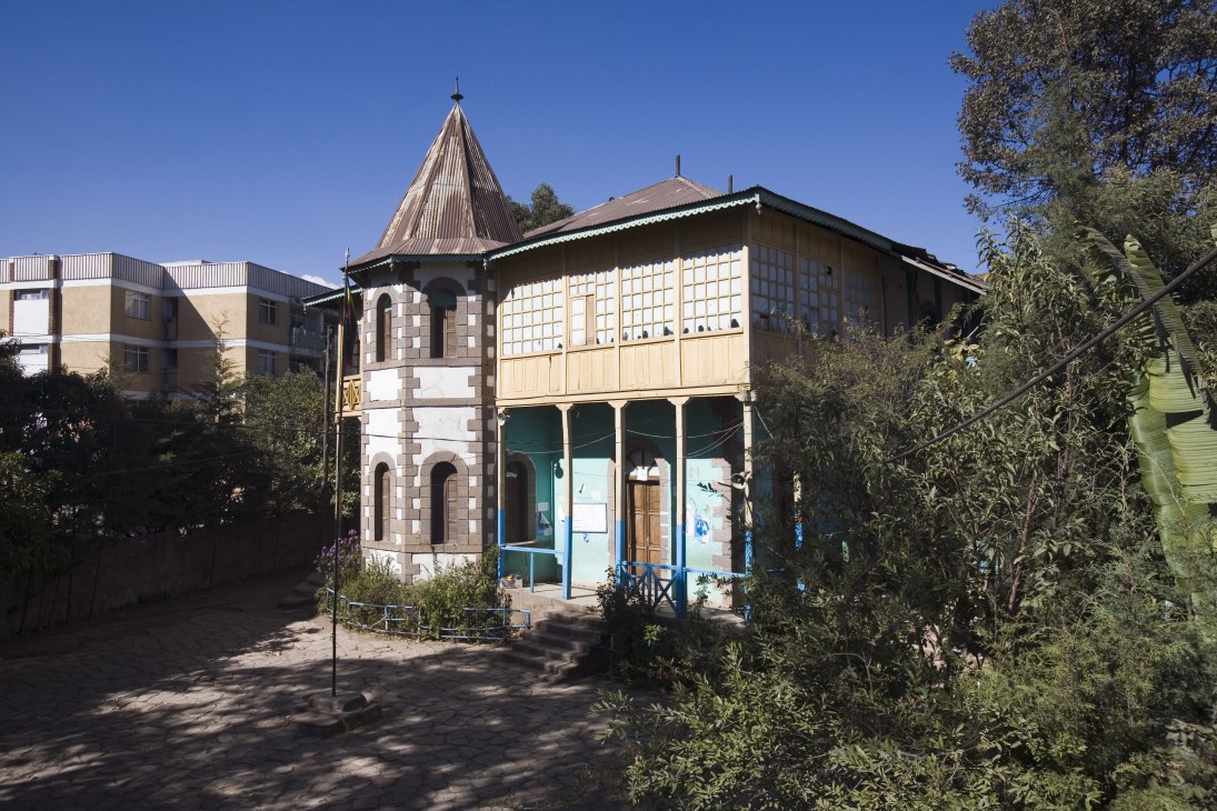 A primary school building in Addis Ababa constructed during Italy's occupation, featuring a distinctive tower and classical architecture.