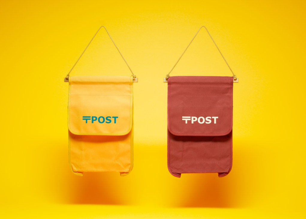 Two colourful canvas postbags inspired by traditional Japanese postbox design, displayed against a yellow background.
