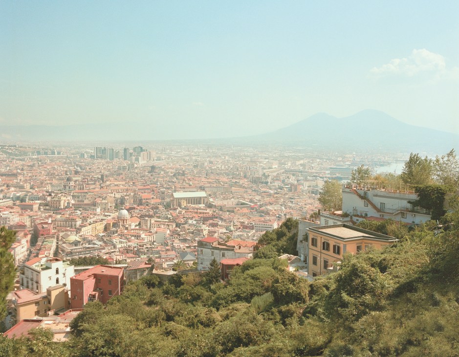 Panoramic view of Naples cityscape with Mount Vesuvius volcano in the distance, seen from San Martino monastery in Vomero.