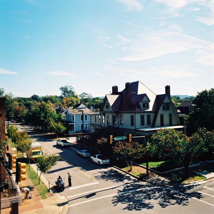 Historic downtown Huntsville street with Victorian-era buildings and antebellum homes.