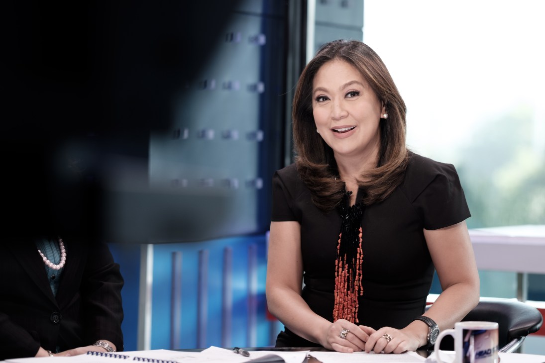 Karen Davila, host of ABS-CBN's morning show Headstart, smiles during a television interview.