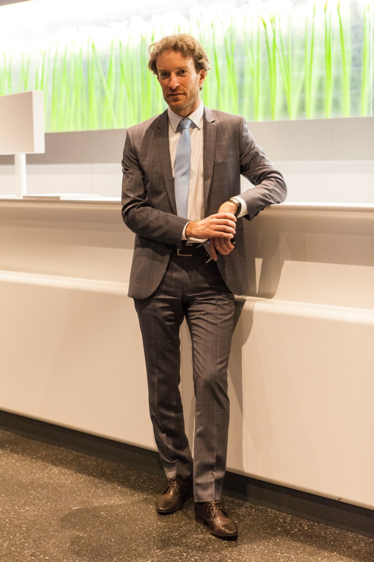 Joachim Ziegler, CEO of Swiss watch retailer Les Ambassadeurs, standing at Baselworld.