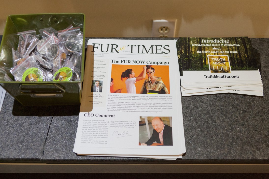 Fur Council of Canada office displaying promotional materials including Fur Times magazine and Truth About Fur campaign materials alongside product samples in a green container.