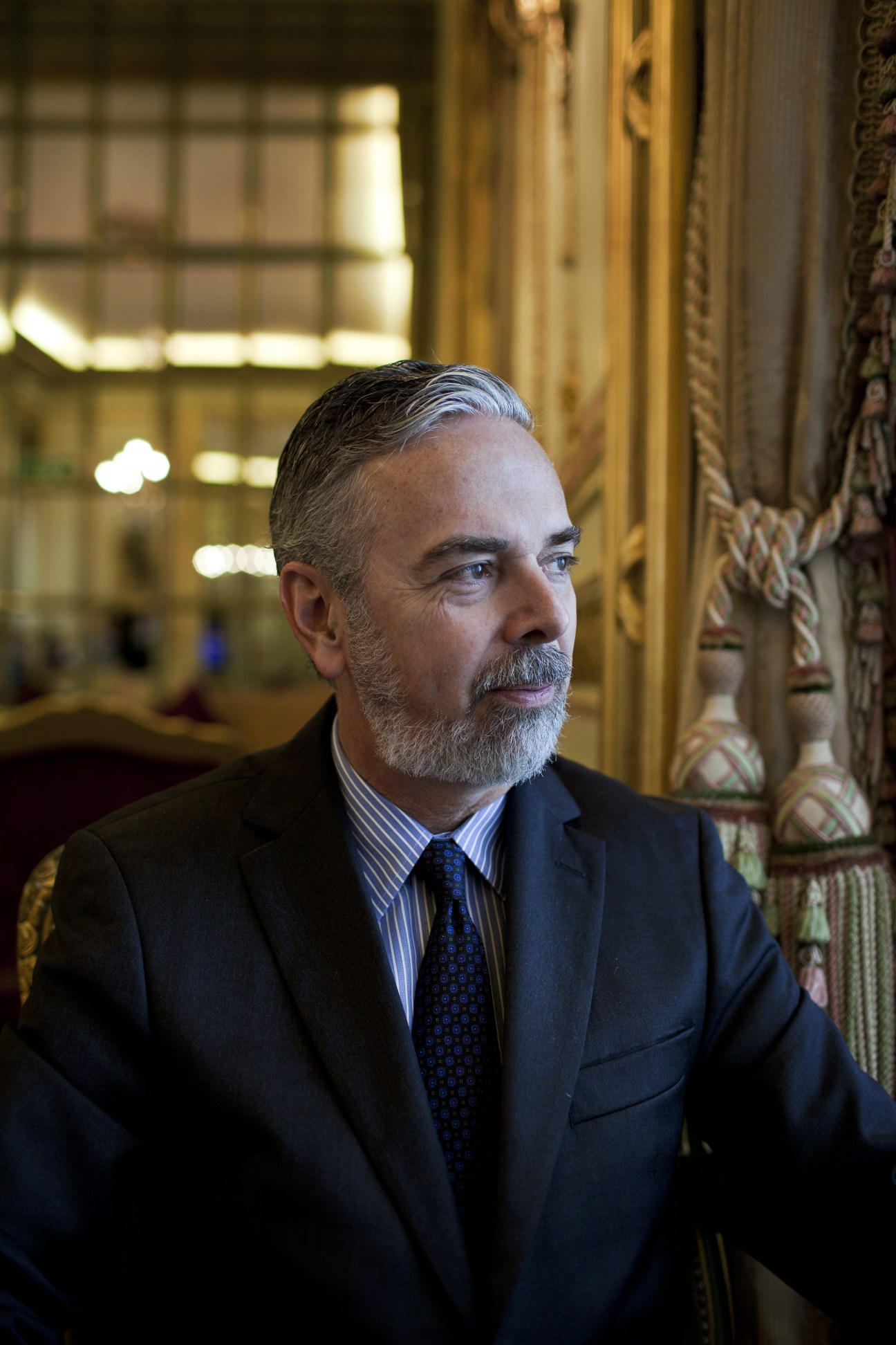 Brazil's foreign minister Antonio Patriota in formal business attire at the Ritz hotel in London.
