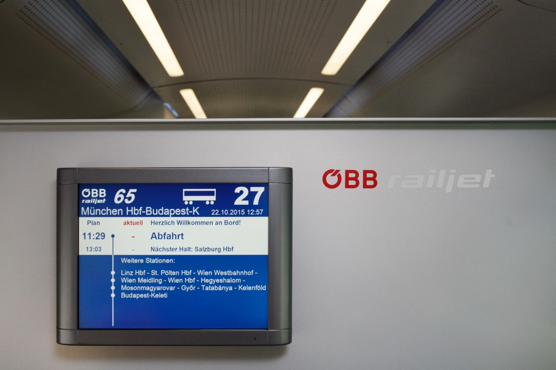 ÖBB Railjet digital display showing train schedule information and route details