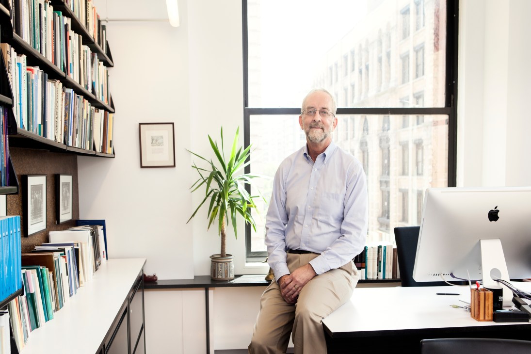 Don Garrett, Professor and chair of the Department of Philosophy, sits in his corner office at NYU.