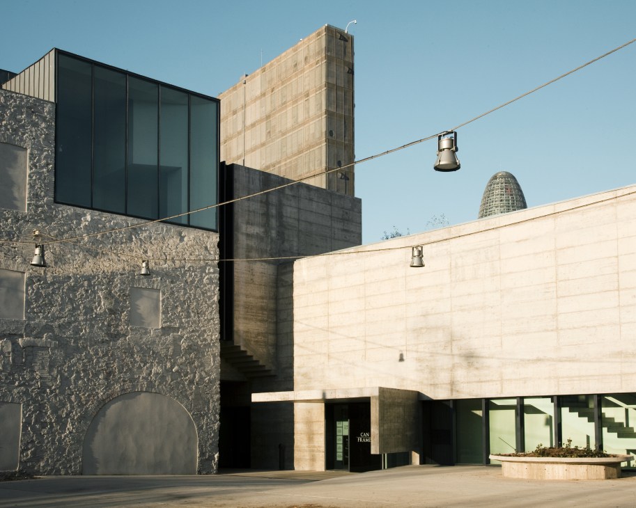 Can Framis Museum exterior featuring modern black and cream architecture with industrial heritage elements.
