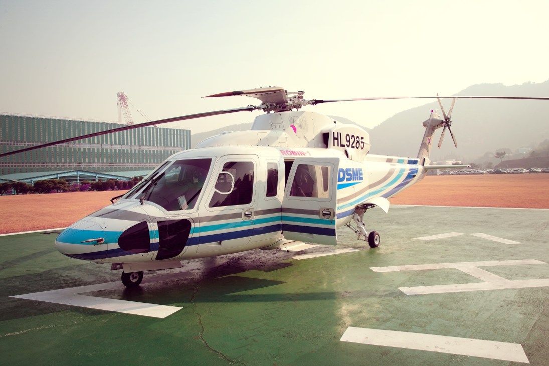 DSME helicopter parked on landing pad at Daewoo Shipbuilding & Marine Engineering shipyard in Okpo.