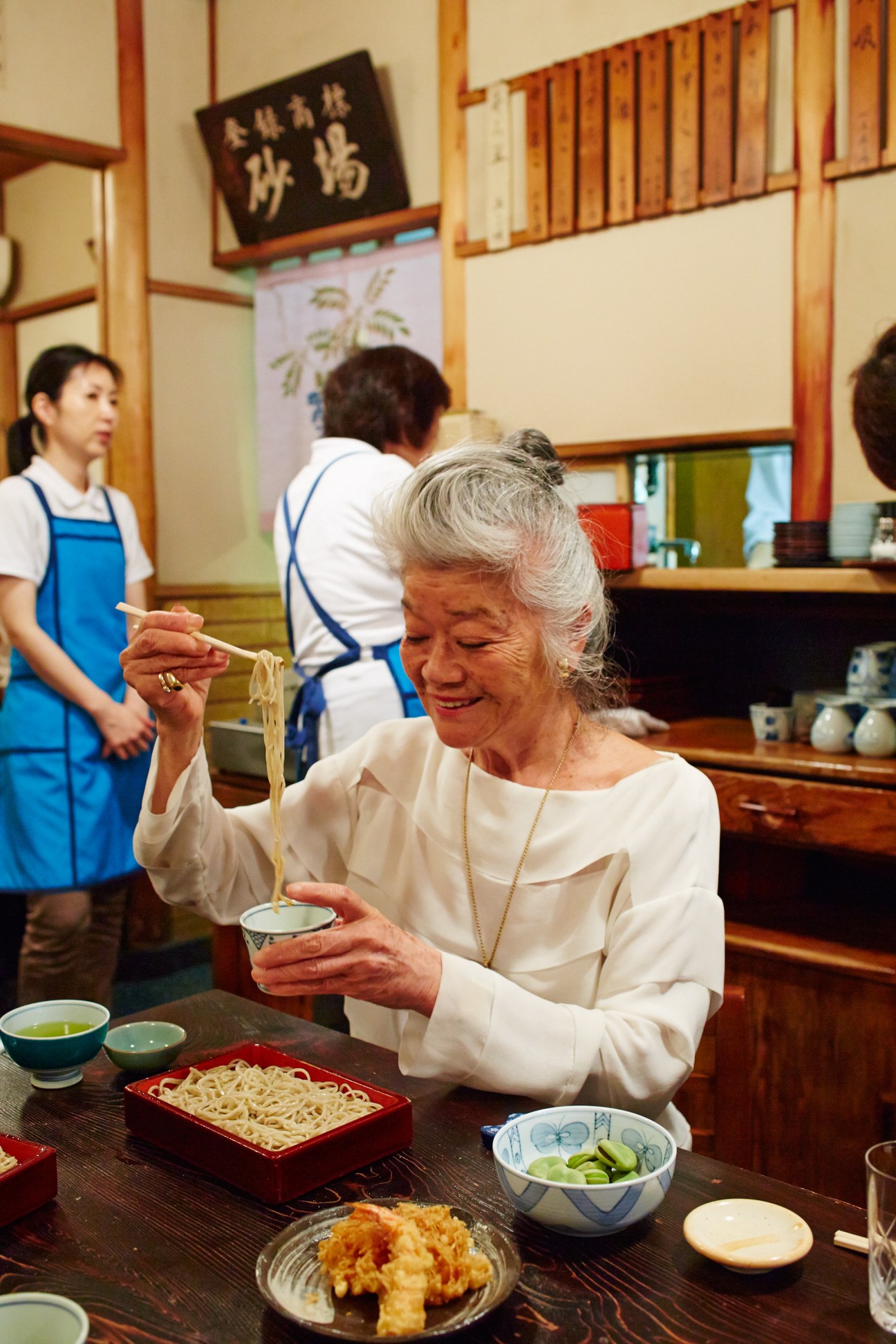 Junko Shimada eating soba noodles at Sunaba restaurant in Tokyo.