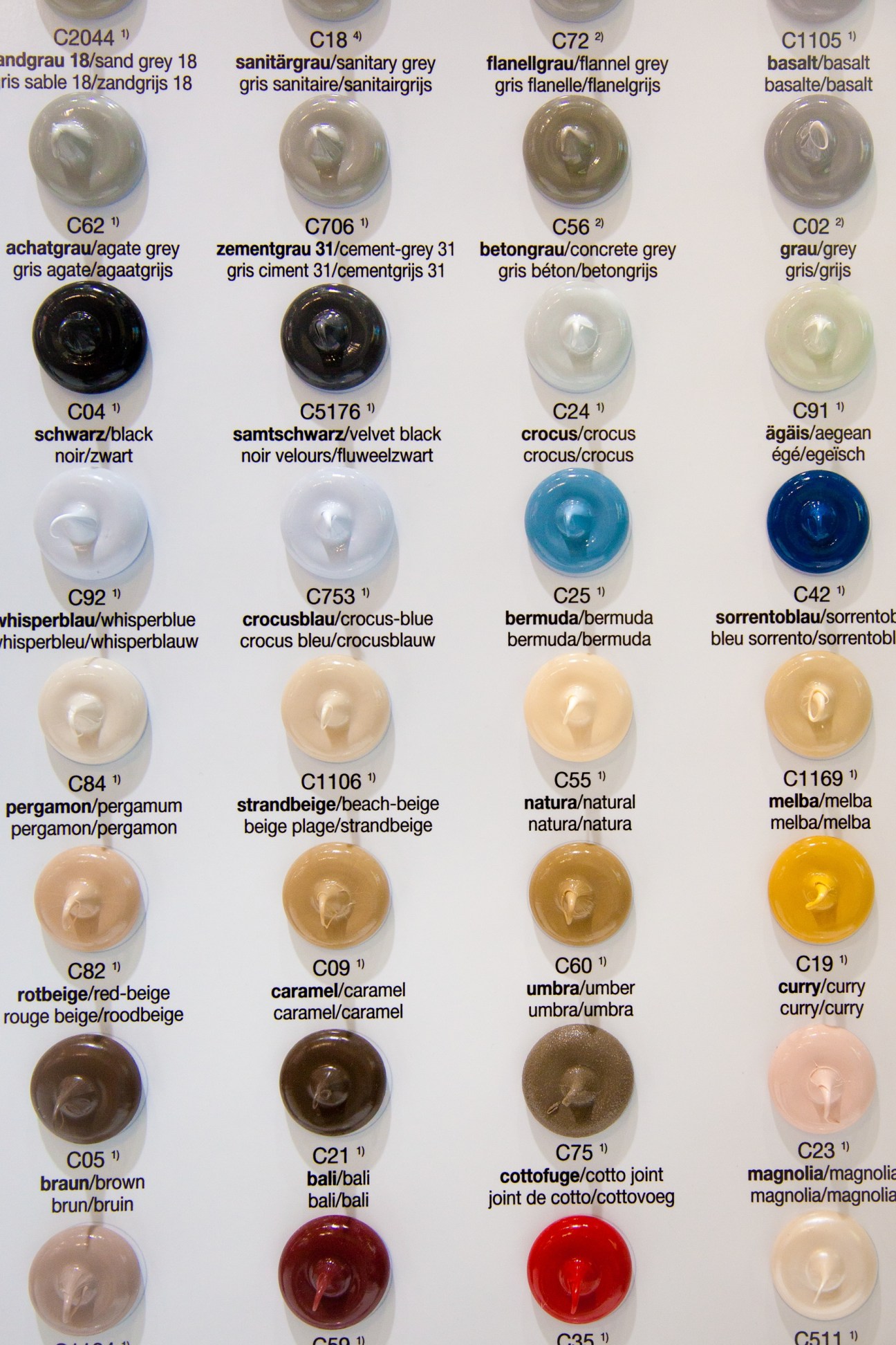 Otto Chemie caulking colour sample chart displaying various shades with multilingual labels.
