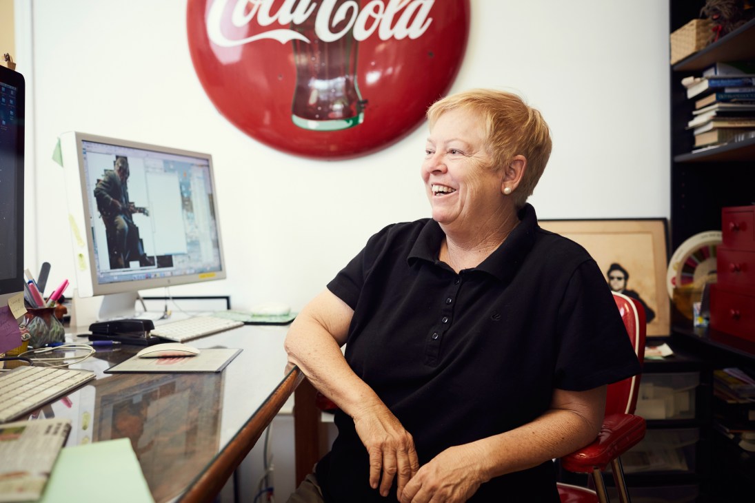 Bonner Joy, owner, publisher and editor of The Islander newspaper, sits at her desk in her office.