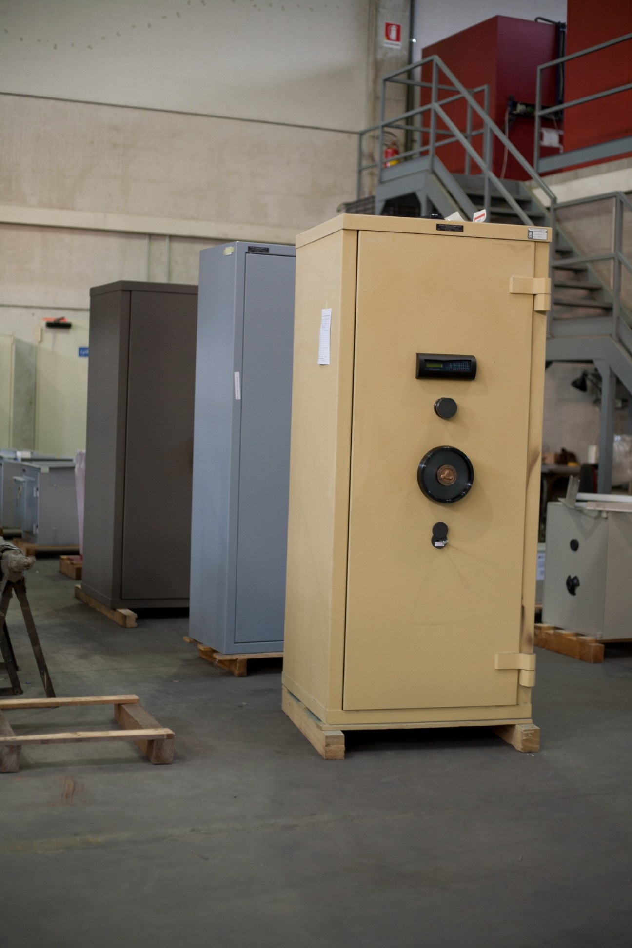 Parma Antonio & Figli's Series E safe in cream color displayed in factory with combination lock and electronic keypad.