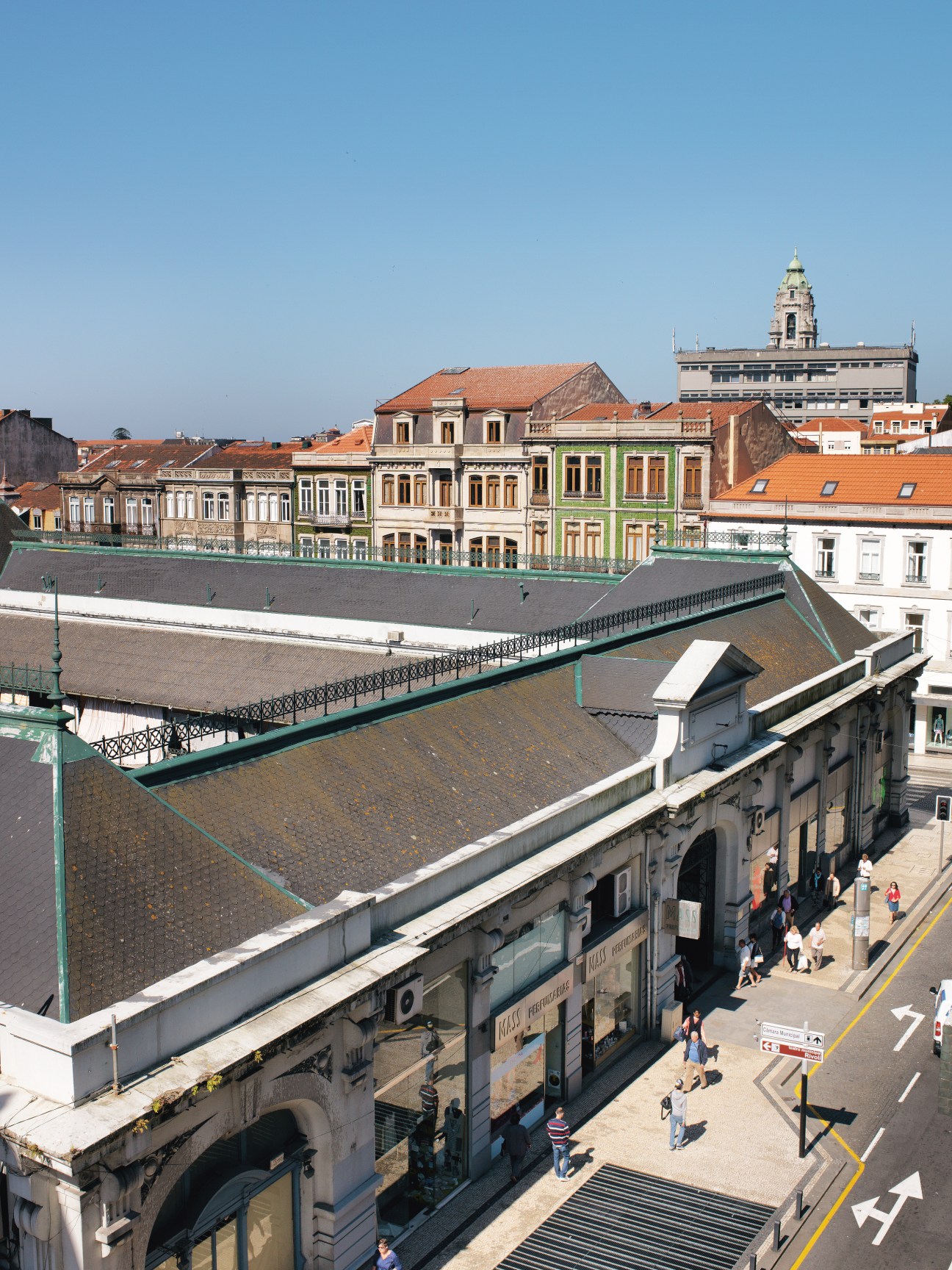 Aerial view of Mercado do Bolhão showing the market's pitched iron roof and neoclassical architecture in Porto's city centre.