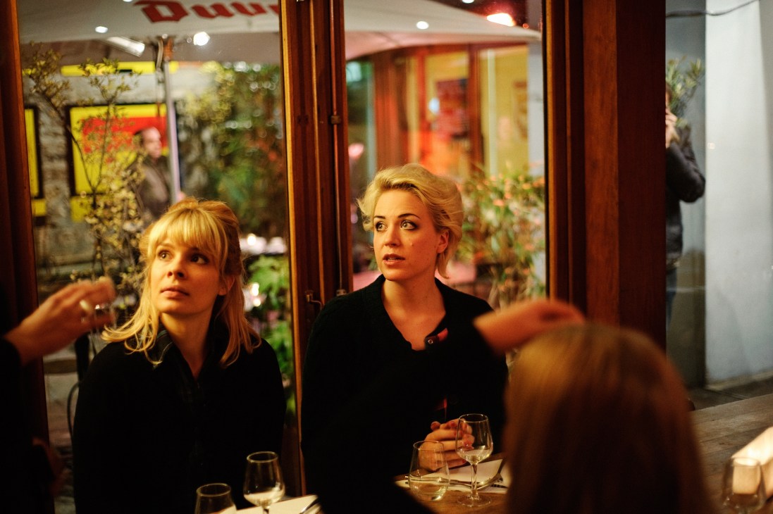 Frida Hyvönen and drummer Tammy Karlsson relaxing backstage before a Paris show