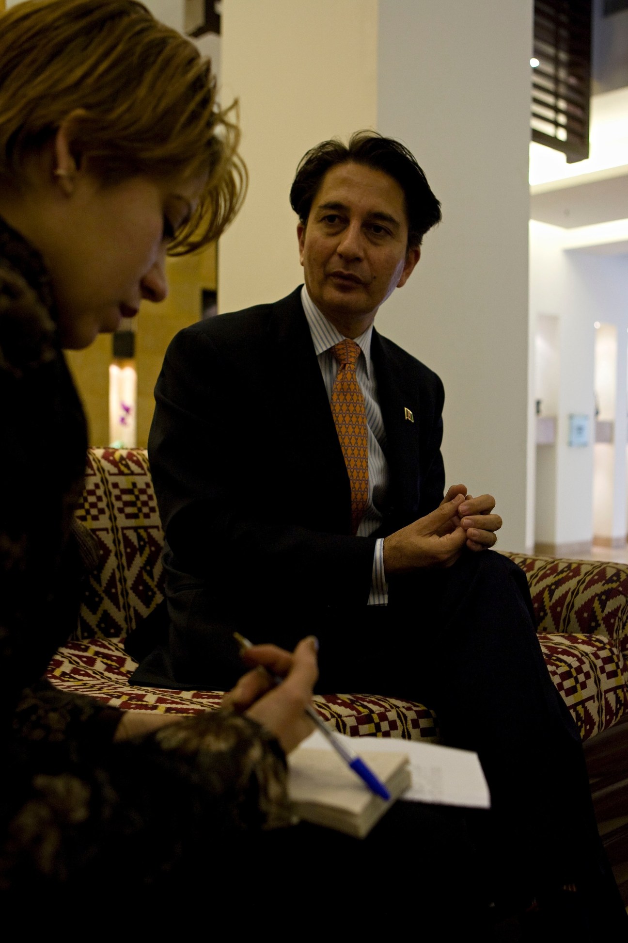 Said Jawad, Afghanistan's ambassador to Washington, is interviewed by a local reporter at the Serena hotel in Kabul.