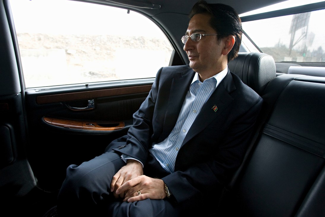 Said Jawad, Afghanistan's ambassador to Washington, sits in the back seat of a car departing Kabul.