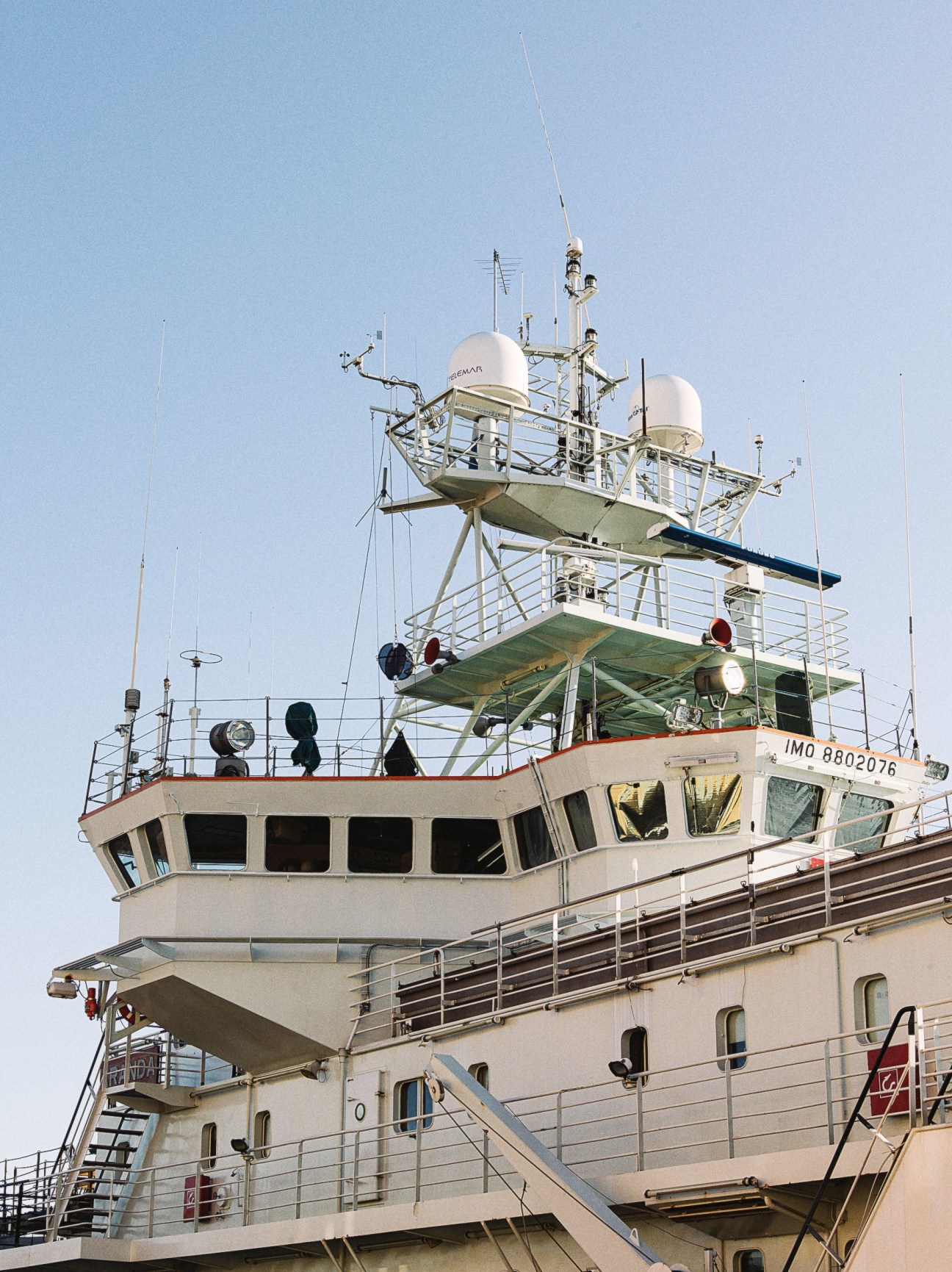 Finnish Environment Institute research vessel Aranda with communications equipment and bridge structure against clear sky.